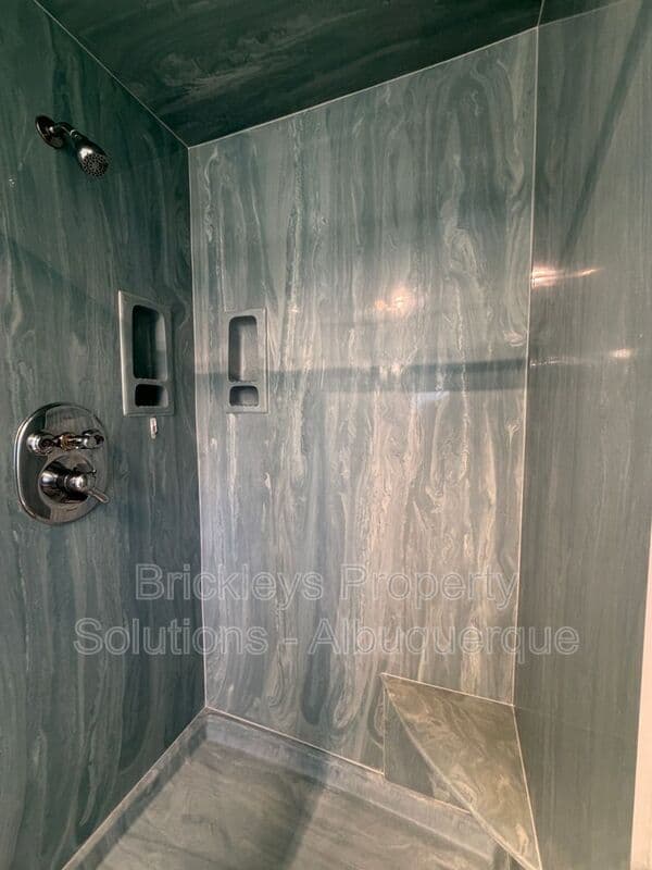 4-bedroom 3-bath home at 7121 Edwina Ave NE for $2,450/mo managed by Brickleys Property Solutions Albuquerque — photo 28 of 47