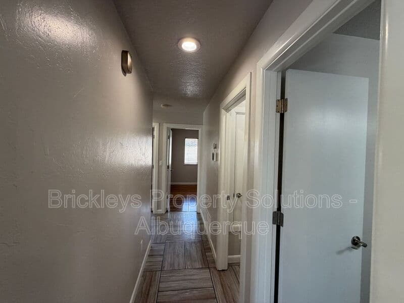 3-bedroom 2-bath home at 7024 Westford Pl NW for $2,200/mo managed by Brickleys Property Solutions Albuquerque — photo 11 of 33