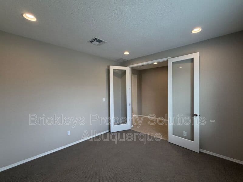 3-bedroom 2-bath home at 938 Lazuli Rd SE for $2,475/mo managed by Brickleys Property Solutions Albuquerque — photo 10 of 36