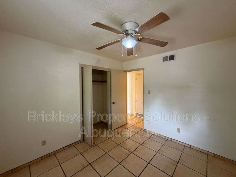 3-bedroom 2-bath home at 9937 Clearwater St. NW for $1,900/mo managed by Brickleys Property Solutions Albuquerque — photo 7 of 27