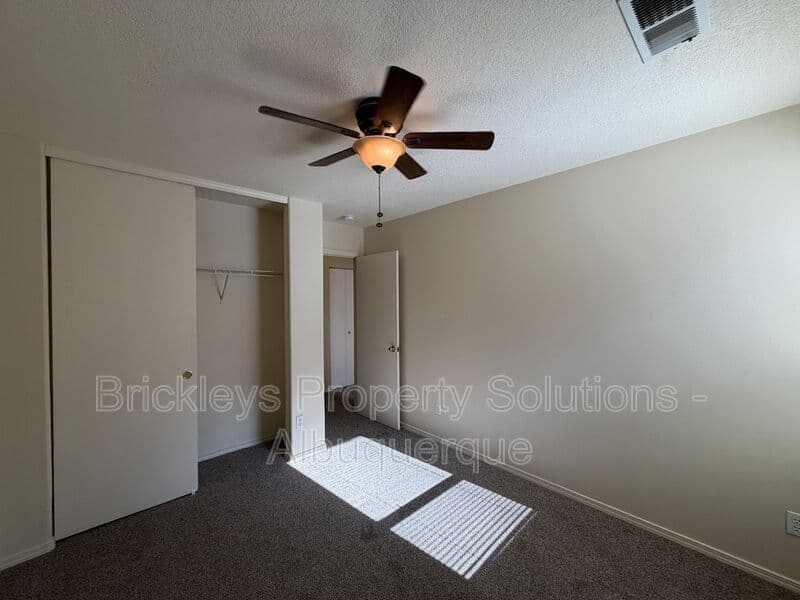 3-bedroom 2-bath home at 7704 Woodstar Ave NW for $1,825/mo managed by Brickleys Property Solutions Albuquerque — photo 22 of 28