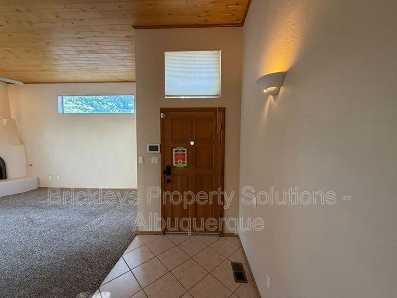 3-bedroom 2-bath home at 12606 Colony Pl NE for $2,250/mo managed by Brickleys Property Solutions Albuquerque — photo 4 of 32