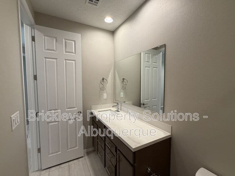 3-bedroom 2-bath home at 938 Lazuli Rd SE for $2,475/mo managed by Brickleys Property Solutions Albuquerque — photo 25 of 36