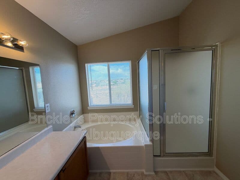 3-bedroom 2.5-bath home at 10527 Brookline Pl NW for $2,300/mo managed by Brickleys Property Solutions Albuquerque — photo 15 of 40
