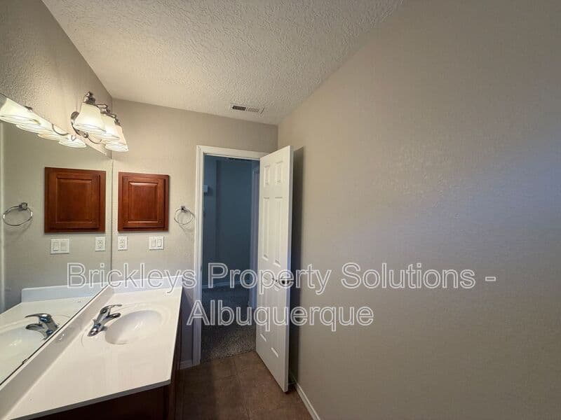 3-bedroom 2-bath home at 8035 Sierra Altos Pl. NW for $2,150/mo managed by Brickleys Property Solutions Albuquerque — photo 20 of 29