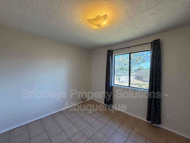 4-bedroom 2-bath home at 5812 Brahma Dr NW for $1,950/mo managed by Brickleys Property Solutions Albuquerque — photo 20 of 35