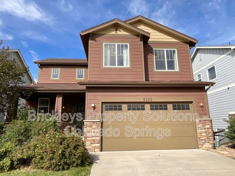 4-bedroom 2.5-bath home at 6652 Maple Stone Ln for $2,600/mo managed by Brickleys Property Solutions Colorado Springs — photo 1 of 43