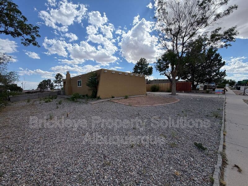 3-bedroom 2-bath home at 5608 Drake Ave NW for $2,100/mo managed by Brickleys Property Solutions Albuquerque — photo 4 of 32