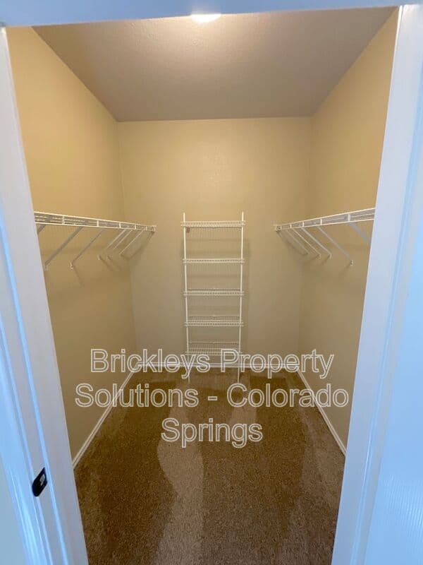 3-bedroom 2-bath home at 3780 Riviera Grove Unit #104 for $1,863/mo total (includes $1,825 base rent + $38 required Tenant Benefit Package) managed by Brickleys Property Solutions Colorado Springs — photo 13 of 24
