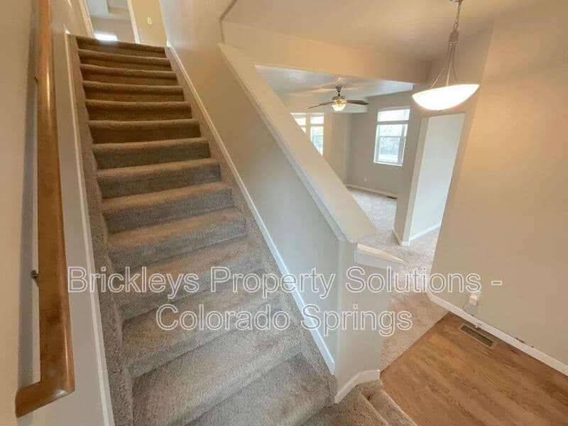 3-bedroom 2.5-bath home at 2401 Ellingwood Dr for $2,233/mo total (includes $2,195 base rent + $38 required Tenant Benefit Package) managed by Brickleys Property Solutions Colorado Springs — photo 25 of 40