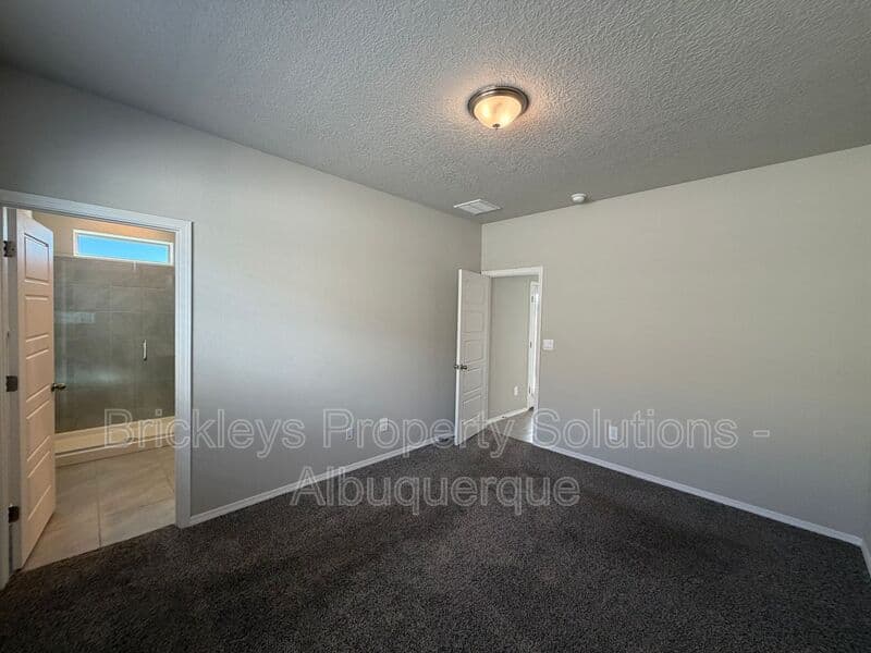 3-bedroom 2-bath home at 614 Turmalina Dr SE for $2,200/mo managed by Brickleys Property Solutions Albuquerque — photo 13 of 29