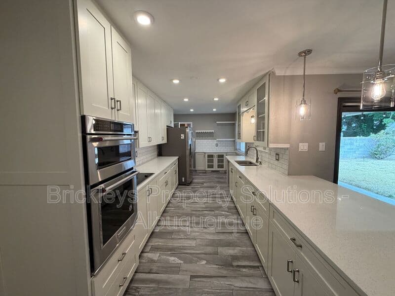 3-bedroom 2-bath home at 2808 Charleston St NE for $2,500/mo managed by Brickleys Property Solutions Albuquerque — photo 26 of 35