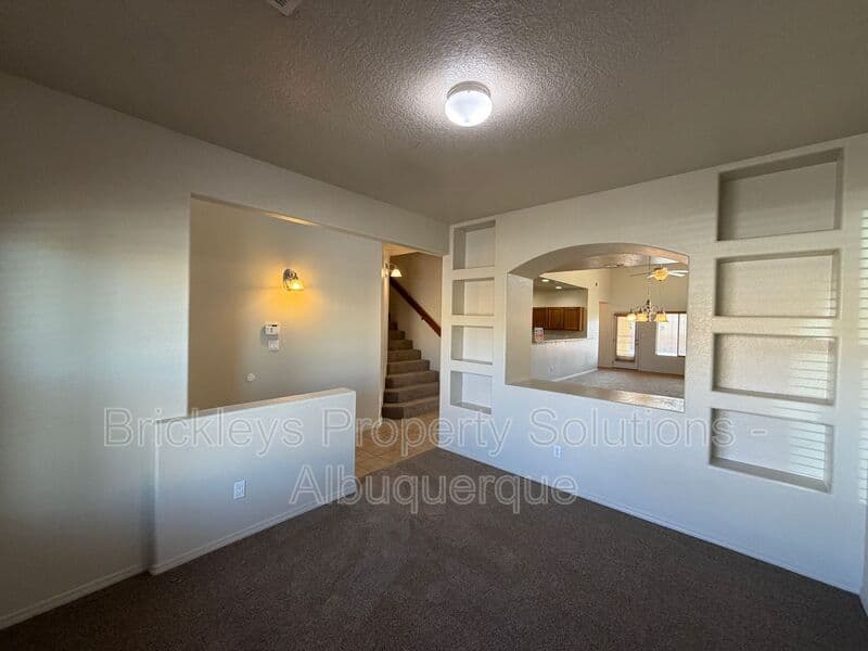 4-bedroom 3.5-bath home at 6228 Nacional Rd NW for $2,700/mo managed by Brickleys Property Solutions Albuquerque — photo 6 of 44