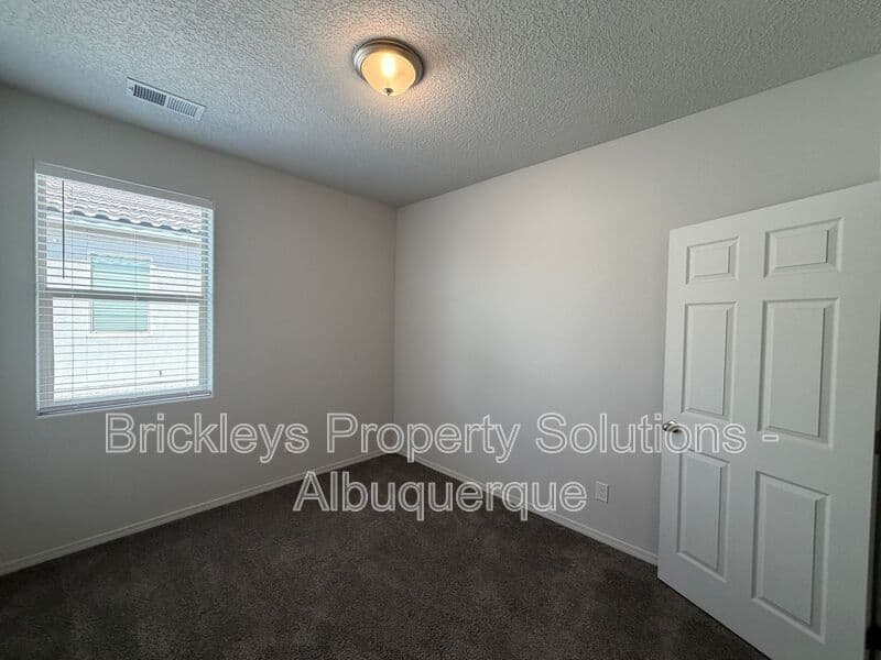 3-bedroom 2-bath home at 1504 Alto Colores for $2,100/mo managed by Brickleys Property Solutions Albuquerque — photo 21 of 30