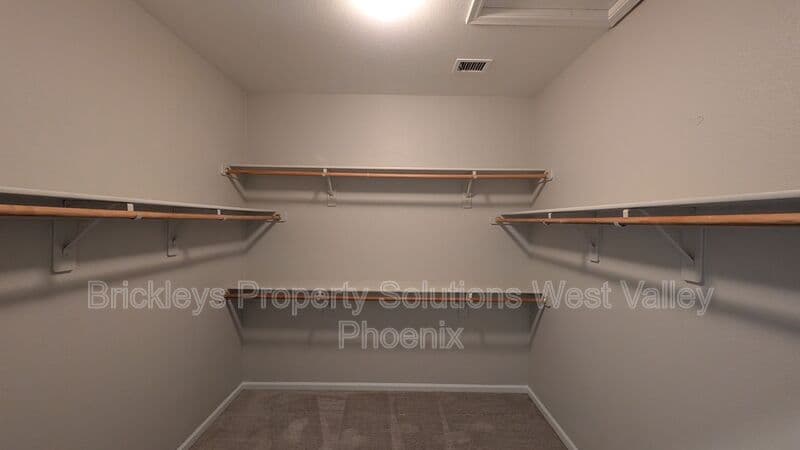 4-bedroom 3-bath home at 13354 W Palm Ln for $2,750/mo managed by Brickleys Property Solutions West Valley Phoenix — photo 8 of 31