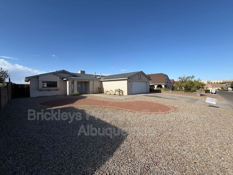 3-bedroom 2-bath home at 4520 Rockaway Loop NE for $1,900/mo managed by Brickleys Property Solutions Albuquerque — photo 2 of 29