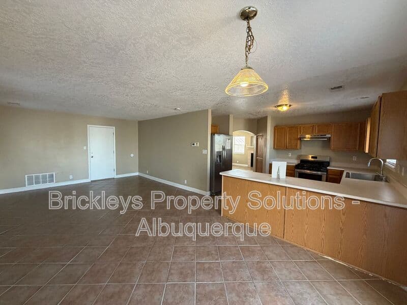 3-bedroom 2.5-bath home at 10527 Brookline Pl NW for $2,300/mo managed by Brickleys Property Solutions Albuquerque — photo 32 of 40
