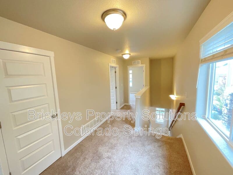 3-bedroom 2.5-bath home at 2401 Ellingwood Dr for $2,233/mo total (includes $2,195 base rent + $38 required Tenant Benefit Package) managed by Brickleys Property Solutions Colorado Springs — photo 26 of 40
