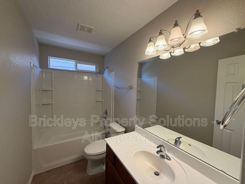 3-bedroom 2-bath home at 8035 Sierra Altos Pl. NW for $2,150/mo managed by Brickleys Property Solutions Albuquerque — photo 19 of 29