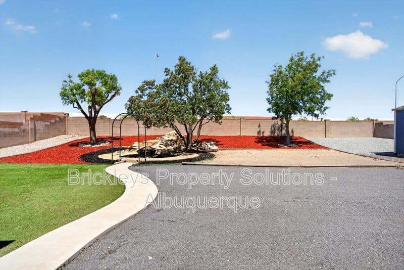 4-bedroom 2-bath home at 2413 Agua Fria Dr NE for $2,275/mo managed by Brickleys Property Solutions Albuquerque — photo 7 of 42