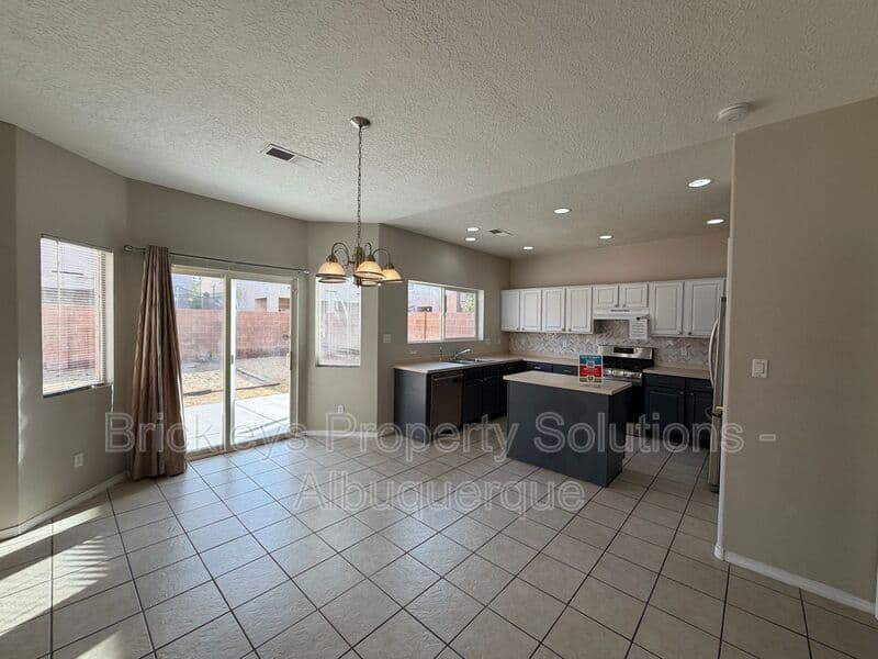 5-bedroom 4.5-bath home at 7008 Tree Line Ave NW for $2,500/mo managed by Brickleys Property Solutions Albuquerque — photo 30 of 43