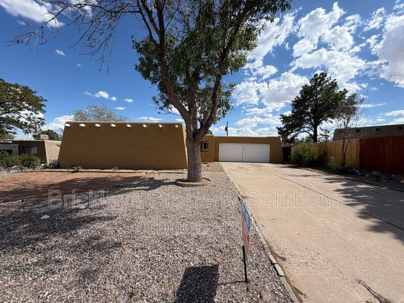 3-bedroom 2-bath home at 5608 Drake Ave NW for $2,100/mo managed by Brickleys Property Solutions Albuquerque — photo 2 of 32
