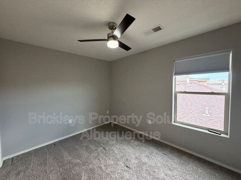 4-bedroom 3-bath home at 860 Fire Wheel Loop for $2,300/mo managed by Brickleys Property Solutions Albuquerque — photo 15 of 40