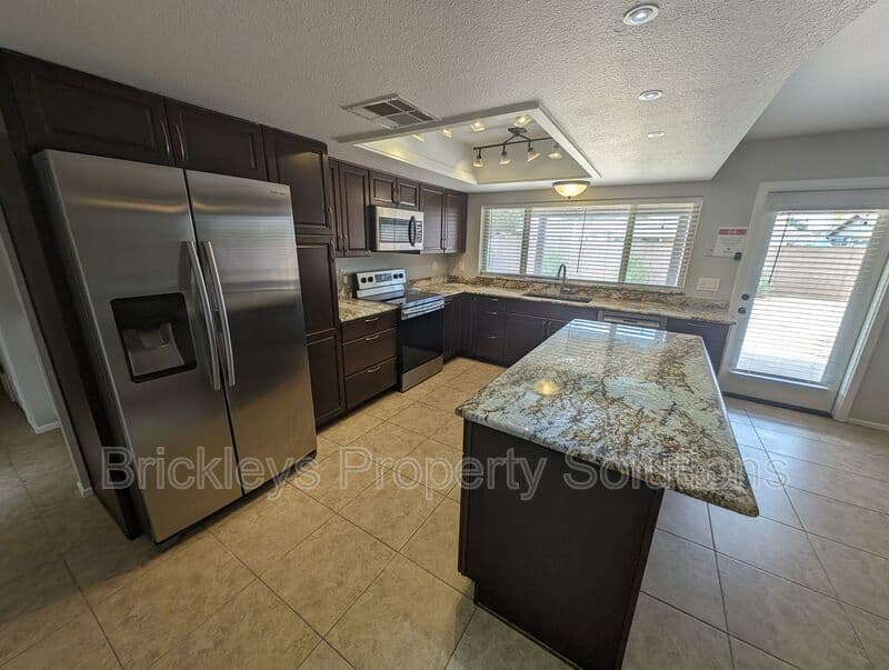 3-bedroom 2-bath home at 2431 W Plata Ave for $2,250/mo managed by Brickleys Property Solutions East Valley Phoenix — photo 13 of 43