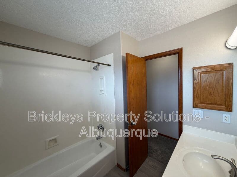 4-bedroom 2.5-bath home at 10331 Dunbar St NW for $2,300/mo managed by Brickleys Property Solutions Albuquerque — photo 19 of 43