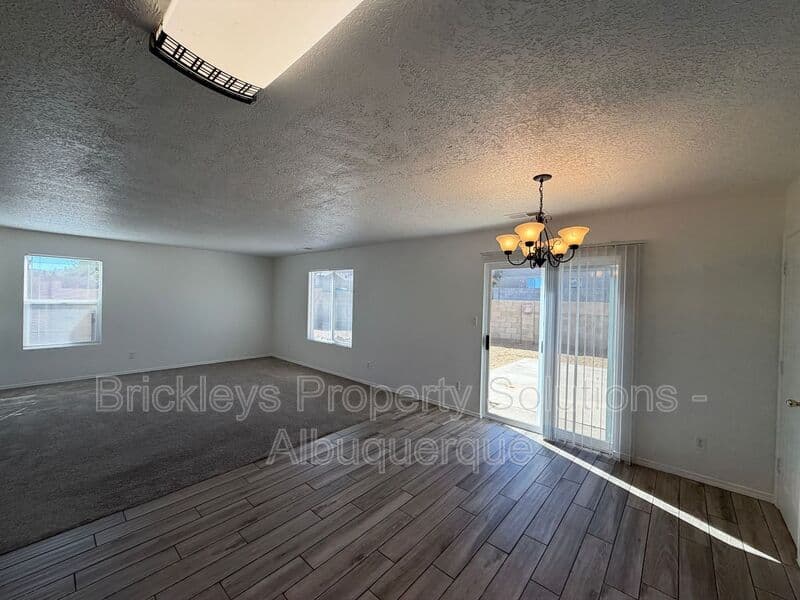 4-bedroom 3-bath home at 6027 Park South Pl NW for $2,400/mo managed by Brickleys Property Solutions Albuquerque — photo 15 of 36