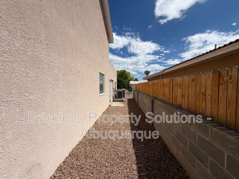 4-bedroom 2.5-bath home at 10331 Dunbar St NW for $2,300/mo managed by Brickleys Property Solutions Albuquerque — photo 42 of 43