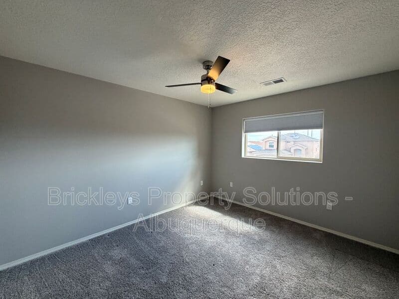 4-bedroom 3-bath home at 860 Fire Wheel Loop for $2,300/mo managed by Brickleys Property Solutions Albuquerque — photo 13 of 40