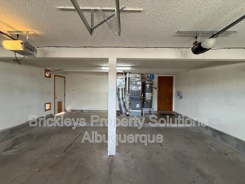 4-bedroom 2.5-bath home at 10331 Dunbar St NW for $2,300/mo managed by Brickleys Property Solutions Albuquerque — photo 39 of 43