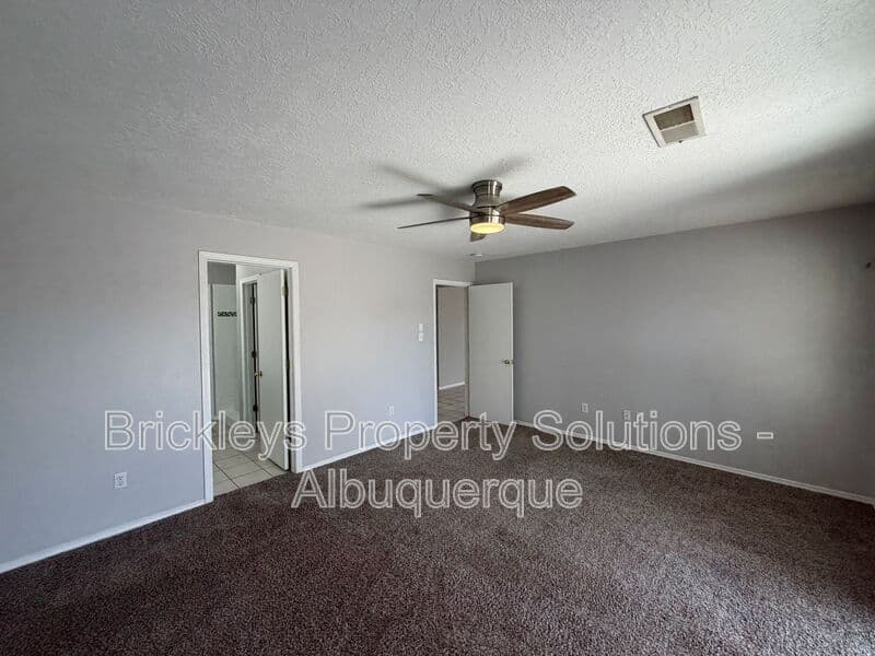 3-bedroom 2-bath home at 10601 Rio Del Sole Ct NW for $2,000/mo managed by Brickleys Property Solutions Albuquerque — photo 13 of 29
