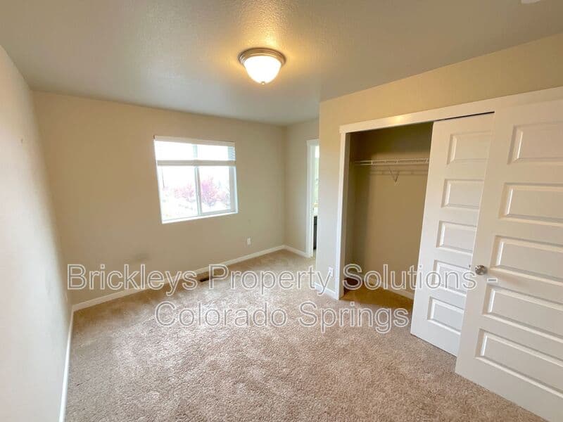 3-bedroom 2.5-bath home at 2401 Ellingwood Dr for $2,233/mo total (includes $2,195 base rent + $38 required Tenant Benefit Package) managed by Brickleys Property Solutions Colorado Springs — photo 34 of 40