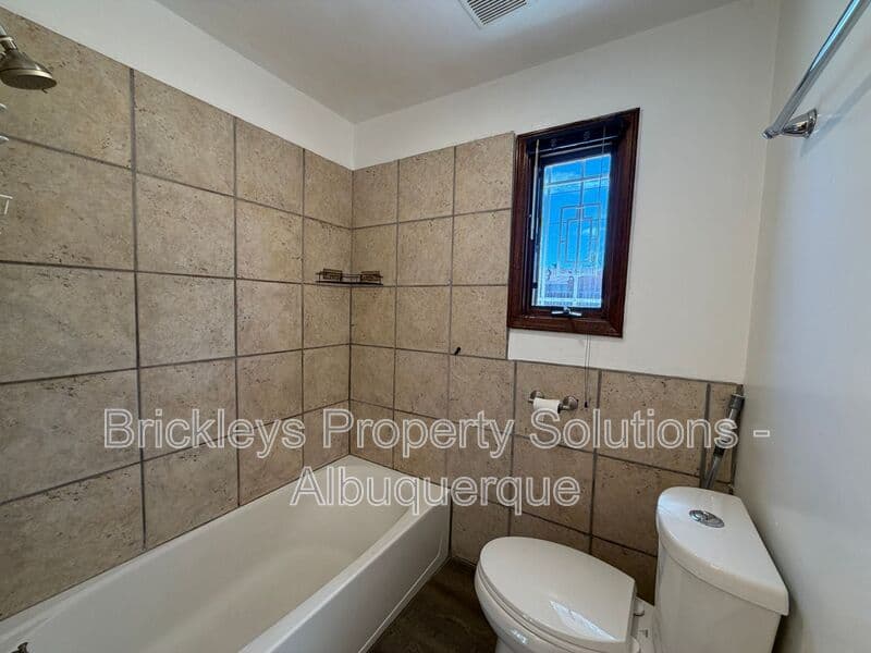 3-bedroom 1-bath home at 2838 La Veta Dr. NE for $1,700/mo managed by Brickleys Property Solutions Albuquerque — photo 15 of 26