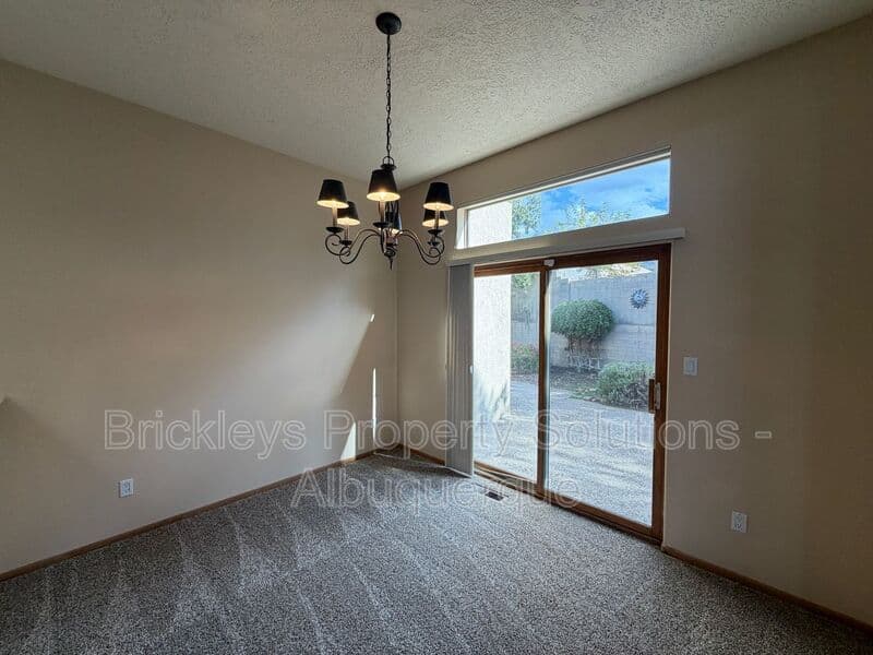 3-bedroom 2-bath home at 12606 Colony Pl NE for $2,250/mo managed by Brickleys Property Solutions Albuquerque — photo 7 of 32