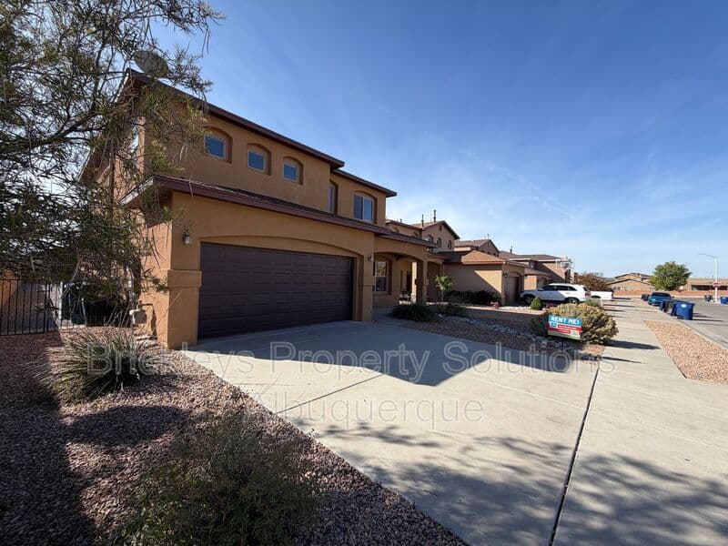 4-bedroom 3.5-bath home at 6228 Nacional Rd NW for $2,700/mo managed by Brickleys Property Solutions Albuquerque — photo 3 of 44
