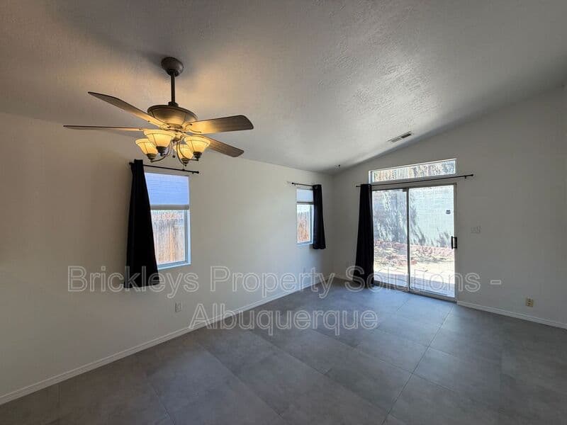 3-bedroom 2-bath home at 6019 Full Moon Ave NW for $1,900/mo managed by Brickleys Property Solutions Albuquerque — photo 9 of 26