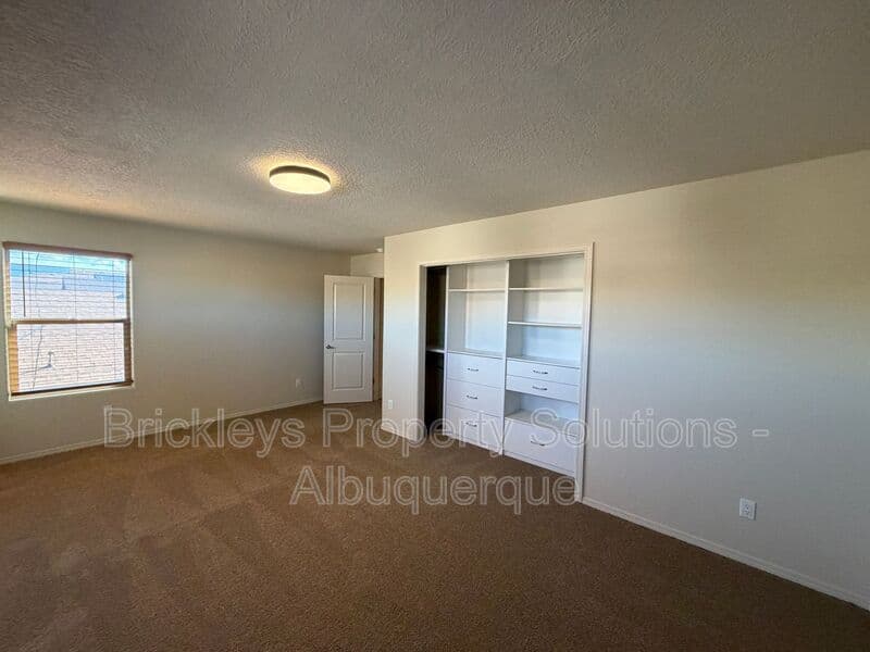 4-bedroom 3.5-bath home at 6228 Nacional Rd NW for $2,700/mo managed by Brickleys Property Solutions Albuquerque — photo 9 of 44