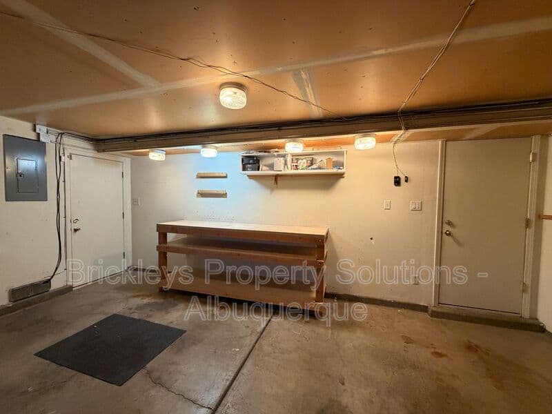 4-bedroom 3-bath home at 7121 Edwina Ave NE for $2,450/mo managed by Brickleys Property Solutions Albuquerque — photo 39 of 47