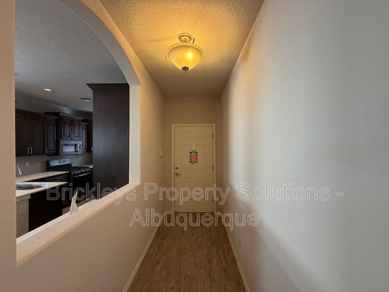 3-bedroom 2-bath home at 5815 Mafraq Ave NW for $2,150/mo managed by Brickleys Property Solutions Albuquerque — photo 4 of 32
