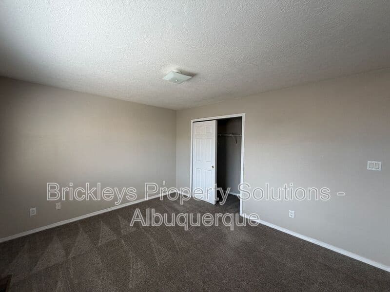 5-bedroom 4.5-bath home at 7008 Tree Line Ave NW for $2,500/mo managed by Brickleys Property Solutions Albuquerque — photo 8 of 43