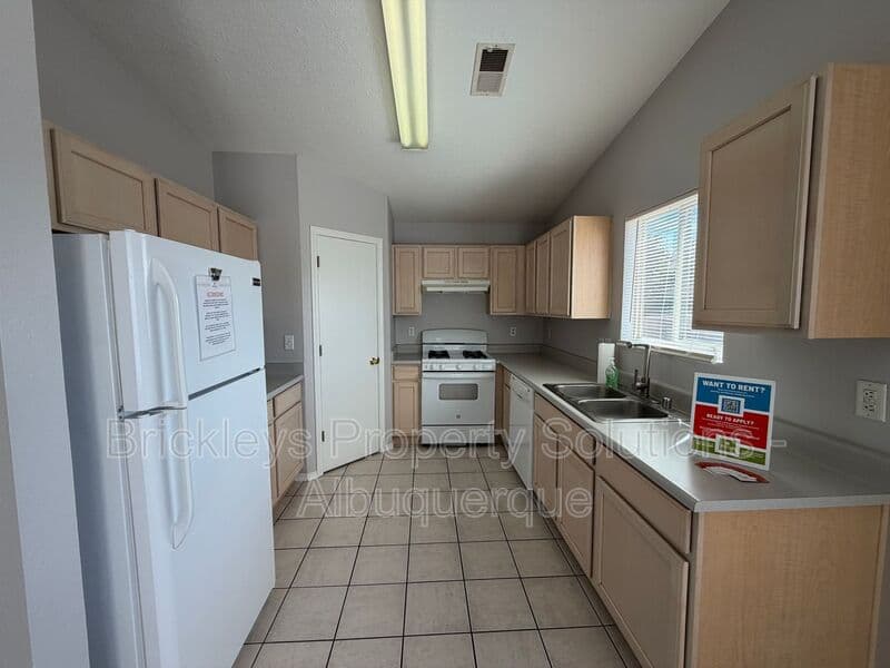 3-bedroom 2-bath home at 10601 Rio Del Sole Ct NW for $2,000/mo managed by Brickleys Property Solutions Albuquerque — photo 9 of 29