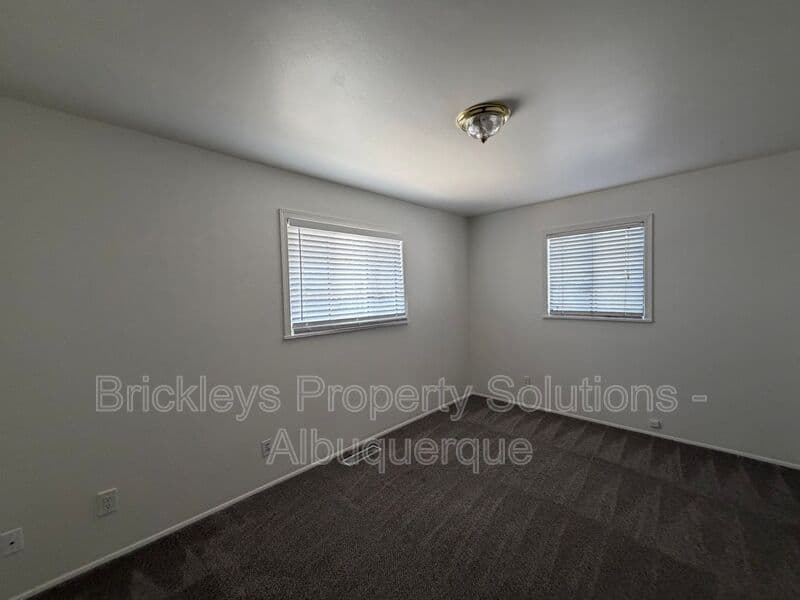 3-bedroom 2-bath home at 4712 Palo Duro Ave. NE for $1,750/mo managed by Brickleys Property Solutions Albuquerque — photo 22 of 38