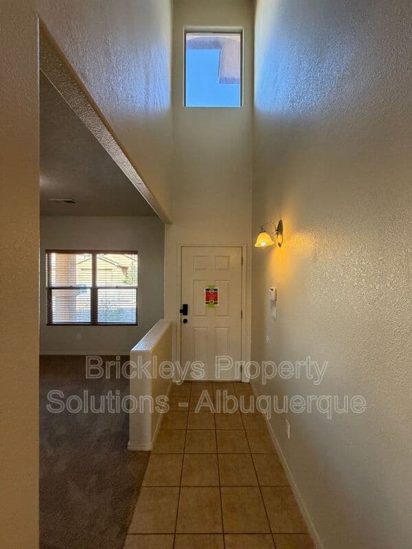 4-bedroom 3.5-bath home at 6228 Nacional Rd NW for $2,700/mo managed by Brickleys Property Solutions Albuquerque — photo 4 of 44