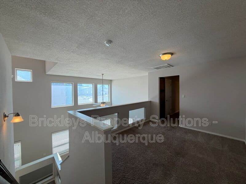 4-bedroom 2.5-bath home at 7420 Tangerine Court NE for $2,450/mo managed by Brickleys Property Solutions Albuquerque — photo 11 of 39