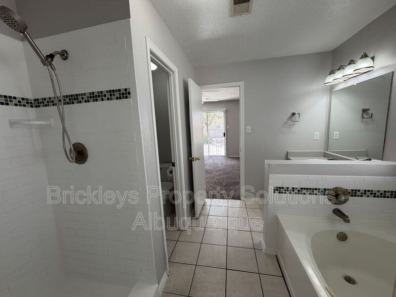 3-bedroom 2-bath home at 10601 Rio Del Sole Ct NW for $2,000/mo managed by Brickleys Property Solutions Albuquerque — photo 16 of 29