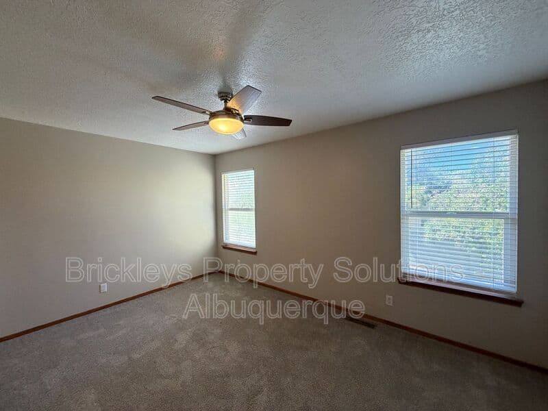 4-bedroom 2.5-bath home at 10331 Dunbar St NW for $2,300/mo managed by Brickleys Property Solutions Albuquerque — photo 12 of 43