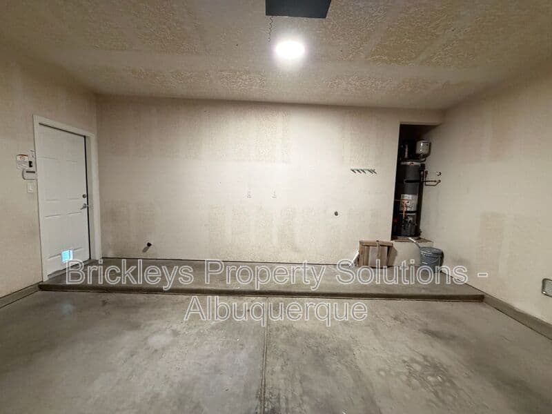 3-bedroom 2.5-bath home at 418 Paseo Roja Pl NE for $2,375/mo managed by Brickleys Property Solutions Albuquerque — photo 38 of 42